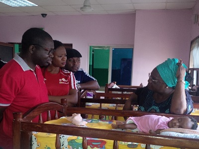 (L-r): Olayinka Oni, Olatomiwa Williams and Kabelo Makwane, all of Microsoft Nigeria, Mrs. Laja Adedoyin, Founder, Hearts of Gold Hospice and Amanda Adedoyin during the Microsoft Nigeria Employees visit to the Hospice today to mark the Microsoft Annual Giving Back Day